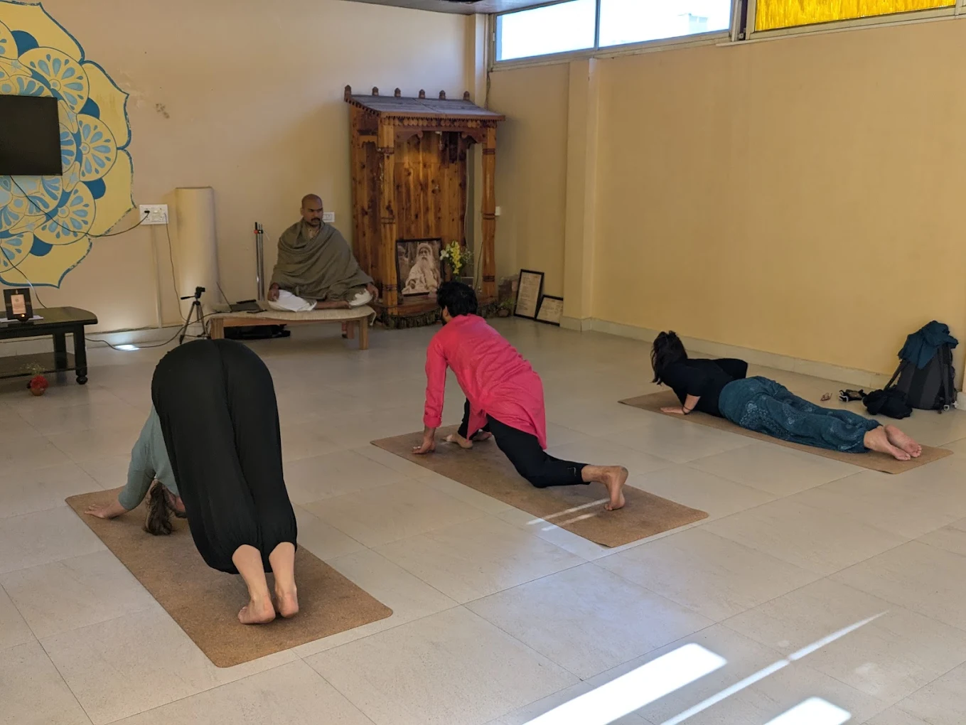 A guided Hatha Yoga practice in progress at the shala
